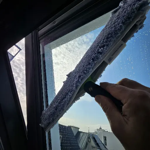 Orloffs T-bar applicator on VELUX skylight glass Orloffs T-bar applicator on VELUX skylight glass